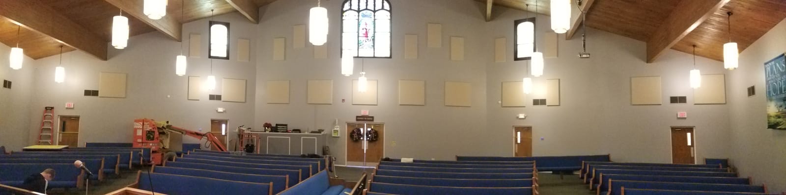 Wide-angle view of full sanctuary acoustic panel installation by Noble A-V